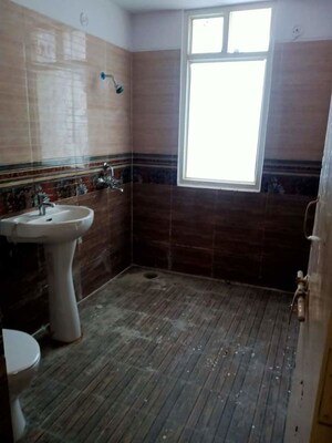 Bathroom in 4 BHK Apartment at Vrindavan Yojna – for Sale
