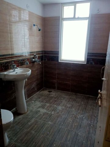 Bathroom in 4 BHK Apartment at Vrindavan Yojna – for Sale