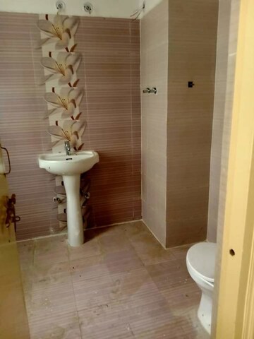 Bathroom in 4 BHK Apartment at Vrindavan Yojna – for Sale