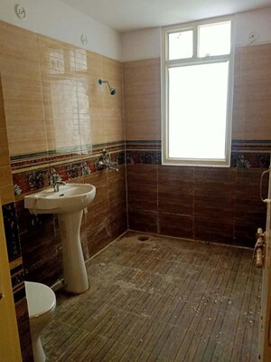 Bathroom in 4 BHK Apartment at Vrindavan Yojna – for Sale