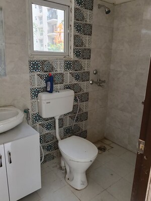 Bathroom in 2 BHK Apartment at Signature Global Proxima, Sector 89 – for Rent