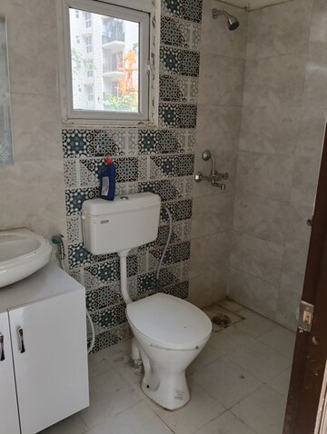 Bathroom in 2 BHK Apartment at Signature Global Proxima, Sector 89 – for Rent