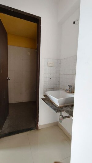 Bathroom in 1.5 BHK Apartment at Palm Atlantis, Wagholi – for Rent