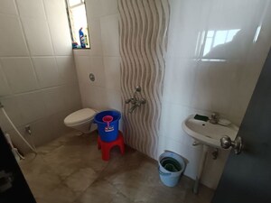 Bathroom in 1 BHK Apartment at Venkatesh Oxy Primo, Wagholi – for Rent