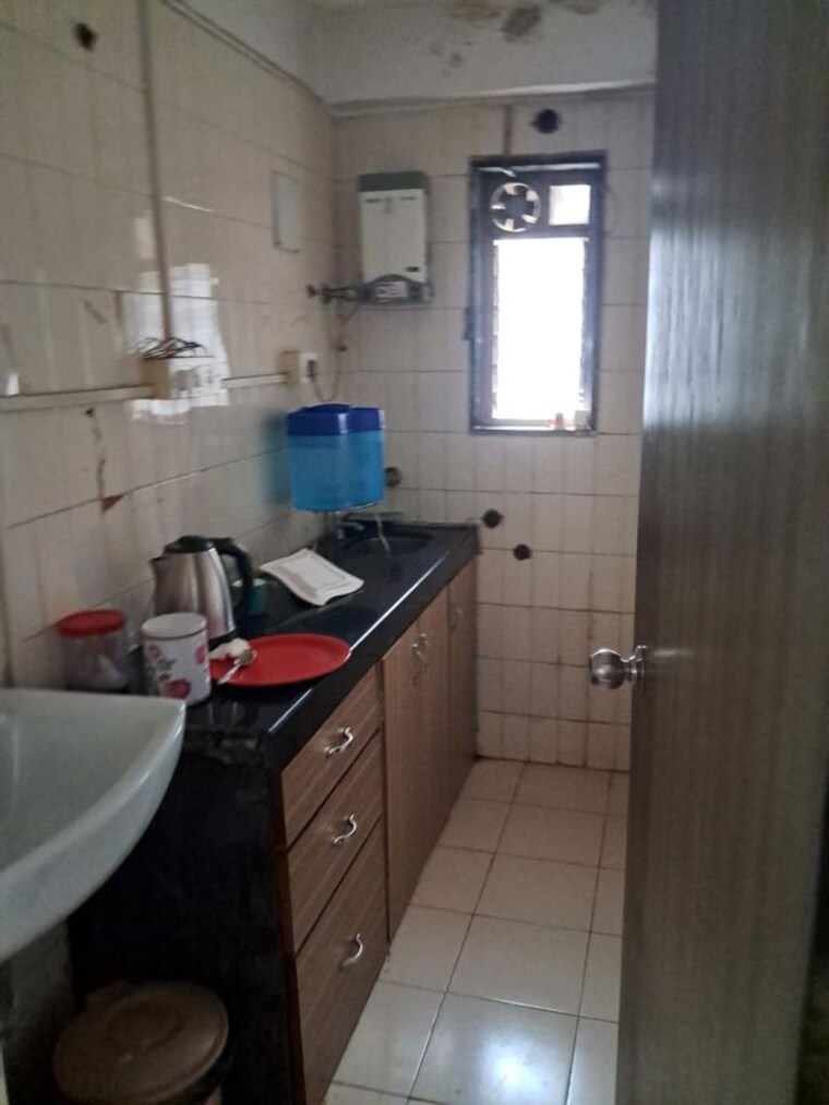 Kitchen, peninsula-address-one 2 Bedroom 580 Sq.Ft. Apartment In Gahunje Pune 9947242