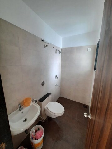 Bathroom in 1 BHK Apartment at Ajmera Exotica, Wagholi – for Rent