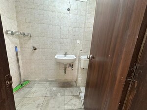 Bathroom in 3 BHK Apartment at Sector 7 Dwarka – for Rent