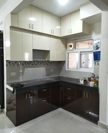 Kitchen in 2 BHK Apartment at Signature Global Orchard Avenue, Sector 93 – for Rent