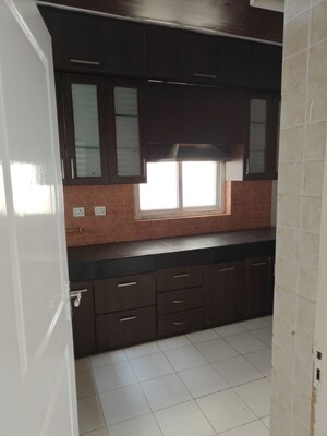 Kitchen in 3.5 BHK Apartment at Orchid Petals, Sector 49 – for Rent