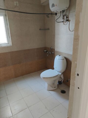 Bathroom in 3.5 BHK Apartment at Orchid Petals, Sector 49 – for Rent