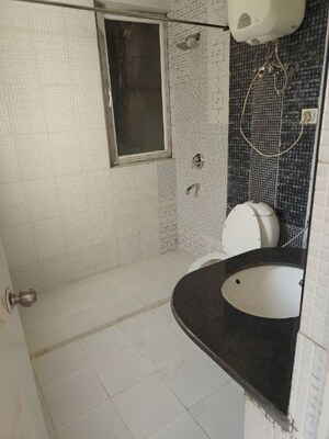 Bathroom in 3.5 BHK Apartment at Orchid Petals, Sector 49 – for Rent