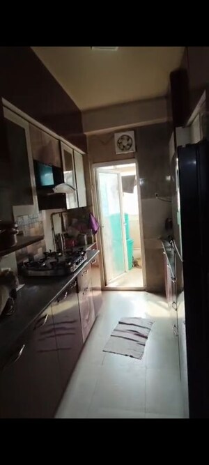 Kitchen in 2 BHK Apartment at Amrapali Empire, Sain Vihar – for Sale