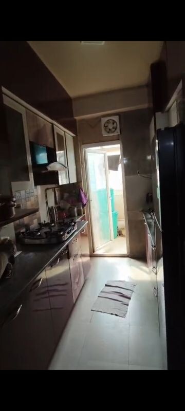 Kitchen in 2 BHK Apartment at Amrapali Empire, Sain Vihar – for Sale