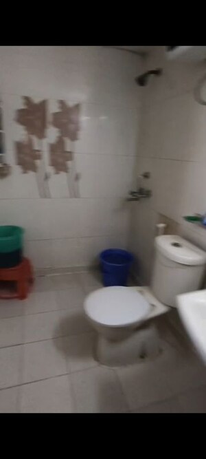 Bathroom in 2 BHK Apartment at Amrapali Empire, Sain Vihar – for Sale