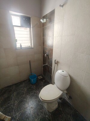 Bathroom in 2 BHK Apartment at Janki Golden Nest, Handewadi – for Rent