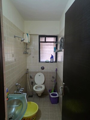 Bathroom in 1 BHK Apartment at Manavsthal Heights, Andheri East – for Rent