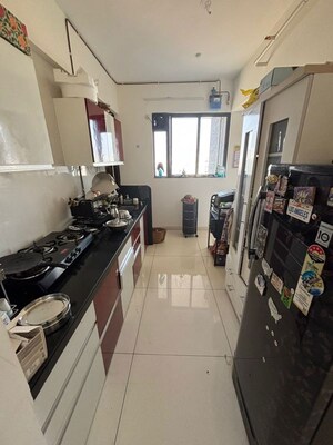 Kitchen in 2 BHK Apartment at Paranjape Broadway, Wakad – for Rent