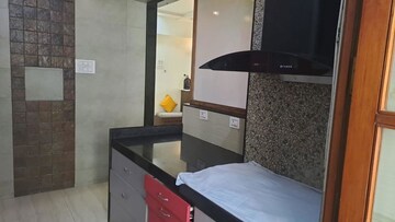 Kitchen in 3 BHK Apartment at Hiranandani Meadows, Manpada – for Rent