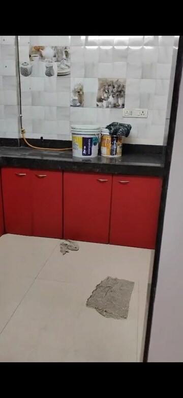 Kitchen in 2 BHK Apartment at Mandalik Nagar CHS, Malad West – for Rent