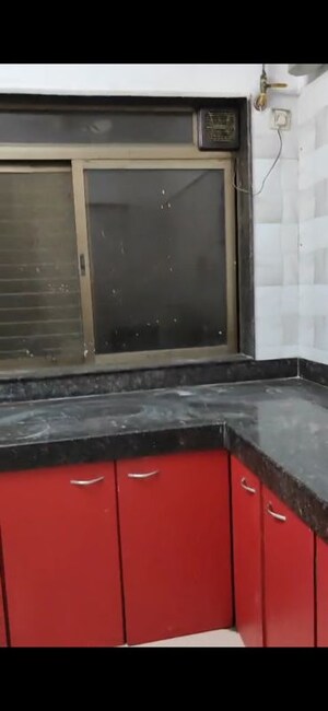 Kitchen in 2 BHK Apartment at Mandalik Nagar CHS, Malad West – for Rent