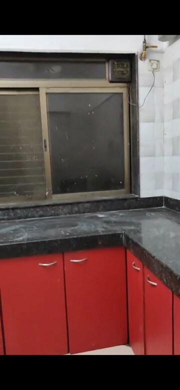 Kitchen in 2 BHK Apartment at Mandalik Nagar CHS, Malad West – for Rent