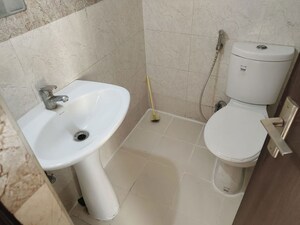 Bathroom in 3 BHK Apartment at Aditya Celebrity Homes, Sector 76 – for Rent