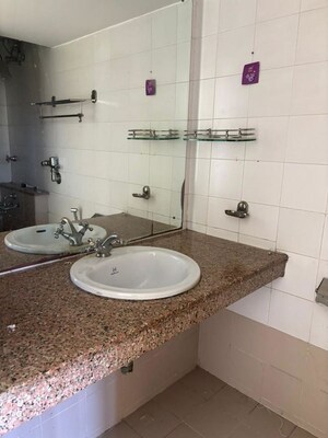Bathroom in 3 BHK Apartment at Hiranandani Garden Brentwood, Powai – for Rent