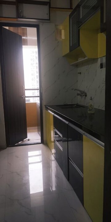 Kitchen in 1.5 BHK Apartment at PGD Pinnacle, Mundhwa – for Rent