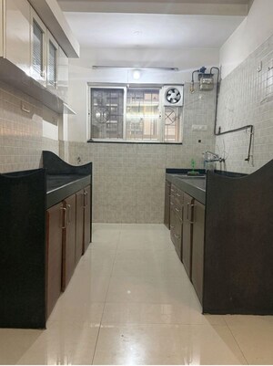 Kitchen in 2 BHK Apartment at G K Jarvari, Pimple Saudagar – for Rent