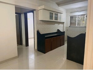Kitchen in 2 BHK Apartment at G K Jarvari, Pimple Saudagar – for Rent