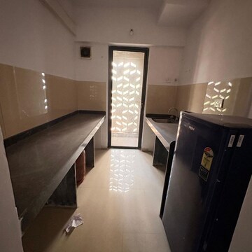 Kitchen in 2 BHK Apartment at Lodha Palava Downtown Dombivli East, Taloja Bypass Road – for Rent