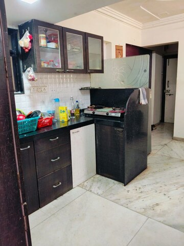 Kitchen in 1 BHK Apartment at Sai Milan CHS, Worli – for Rent