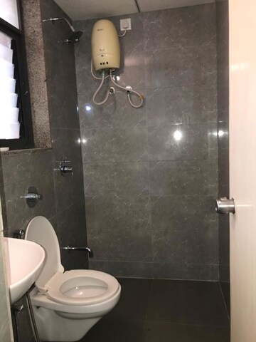 Bathroom in 3 BHK Apartment at Shaligram Prime, Ghuma – for Rent