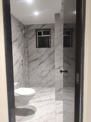 Bathroom in 2 BHK Apartment at Halima Apartment, Madanpura – for Sale