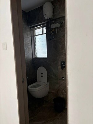 Bathroom in 1 BHK Apartment at Shraddha Pleasant, Vikhroli East – for Rent