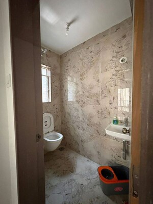 Bathroom in 1 BHK Apartment at Shraddha Pleasant, Vikhroli East – for Rent