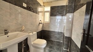Bathroom in 3 BHK Apartment at Angel Jupiter, Ahinsa Khand 2 – for Sale