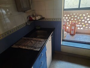 Kitchen in 2 BHK Apartment at Neelkanth Girija, Vartak Nagar – for Sale