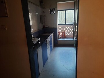 Kitchen in 2 BHK Apartment at Neelkanth Girija, Vartak Nagar – for Sale