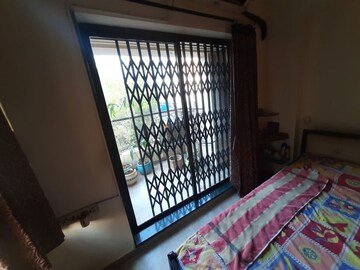 Bedroom in 2 BHK Apartment at Neelkanth Girija, Vartak Nagar – for Sale