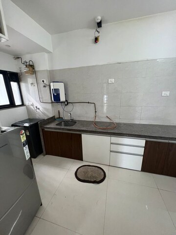 Kitchen in 2 BHK Apartment at Duville Riverdale Heights, Kharadi – for Rent
