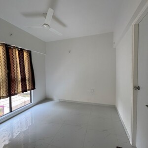 Master Bedroom in 1 BHK Apartment at Lodha Codename Premier, Mangaon – for Sale