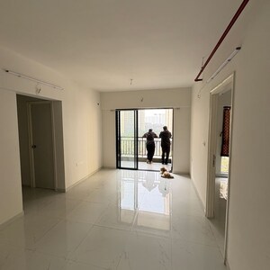 Living Room in 1 BHK Apartment at Lodha Codename Premier, Mangaon – for Sale