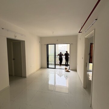 Living Room in 1 BHK Apartment at Lodha Codename Premier, Mangaon – for Sale