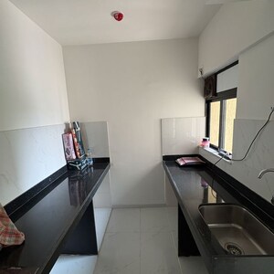 Kitchen in 1 BHK Apartment at Lodha Codename Premier, Mangaon – for Sale