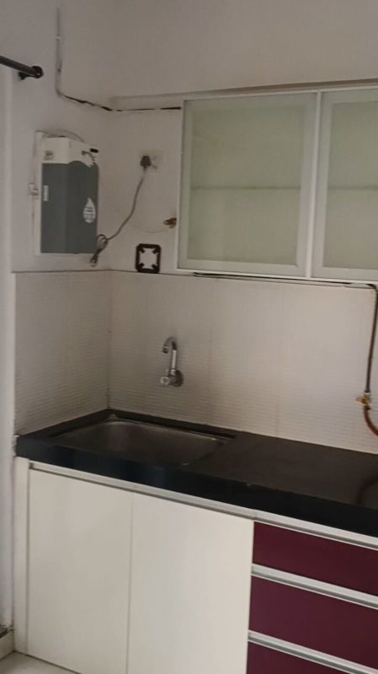Kitchen, pride-world-city-long-island 1.5 Bedroom 784 Sq.Ft. Apartment In Charholi Budruk Pune 9948382