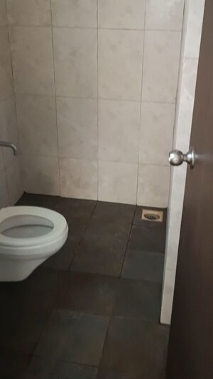 Bathroom in 1.5 BHK Apartment at Pride World City Long Island, Charholi Budruk – for Rent