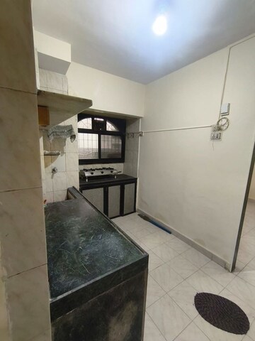 Kitchen in 1 BHK Apartment at Green Field B CHS LTD, Andheri East – for Rent