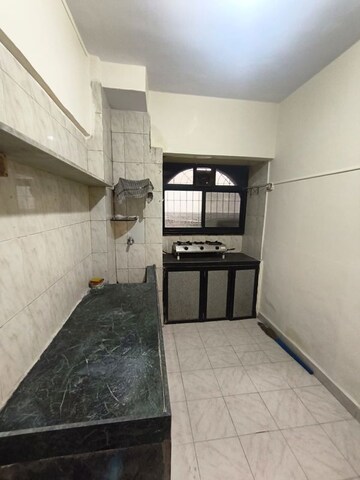 Kitchen in 1 BHK Apartment at Green Field B CHS LTD, Andheri East – for Rent