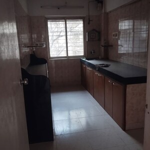 Kitchen in 3 BHK Apartment at Solitaire Malad West, Navy Colony – for Rent
